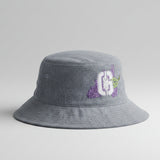 Genesee G Stalk Lilac Bucket Hat. Available in White and Denim.