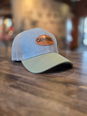 Genesee Leather Patch Trucker Hat Blue and Olive Green